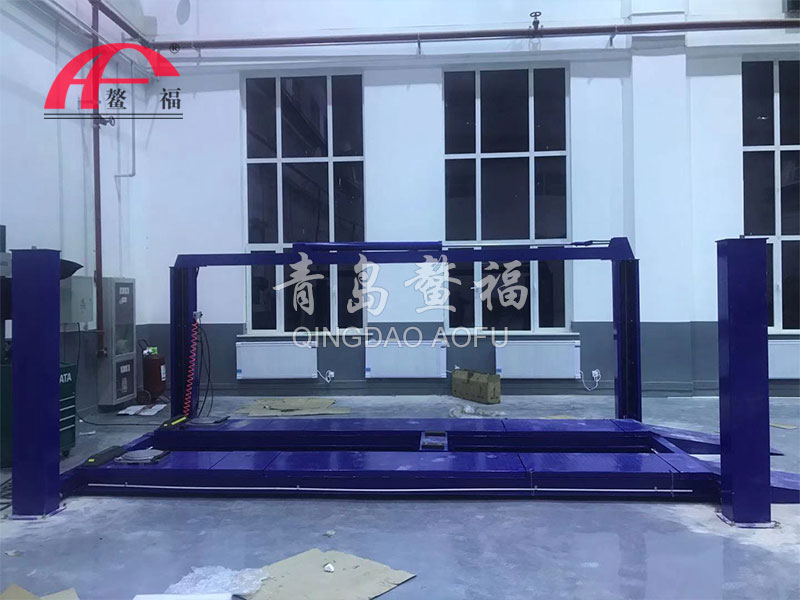 Jiuquan four-post lift with side slide plate maintenance case